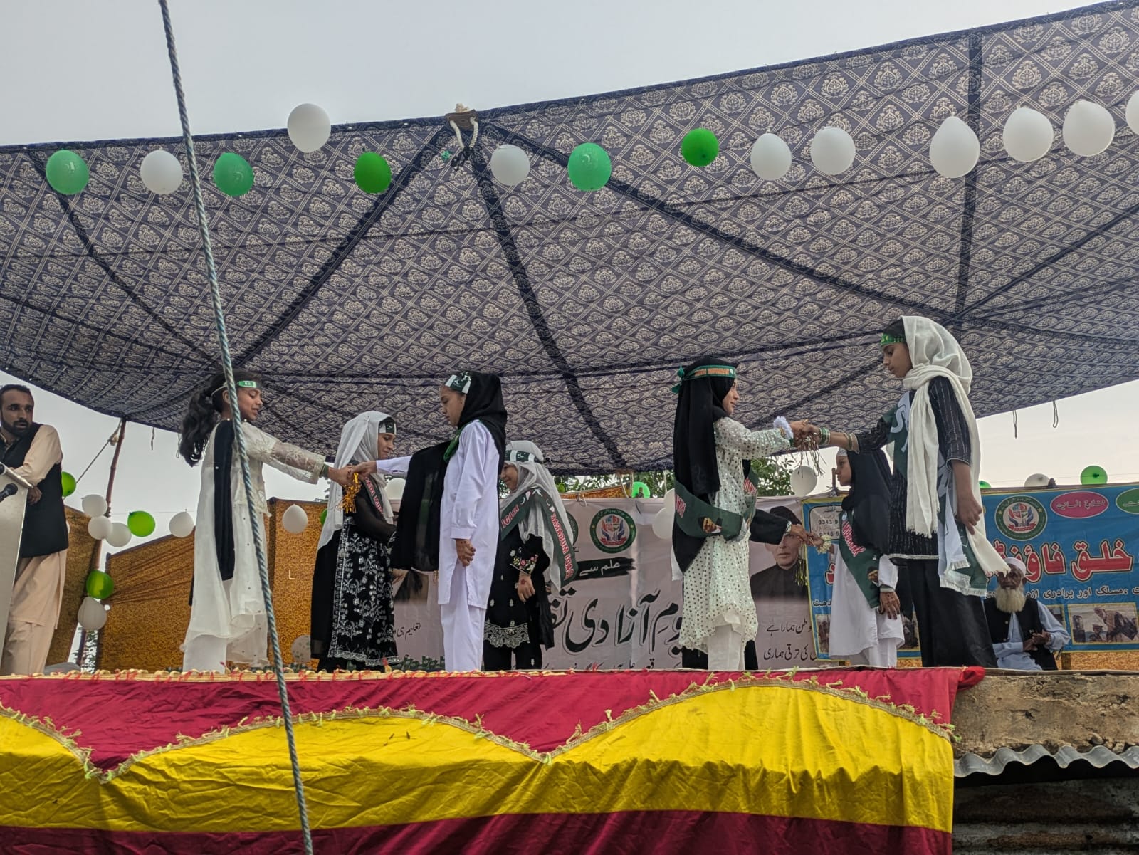 Girls' stage performance at the Independence Day celebration