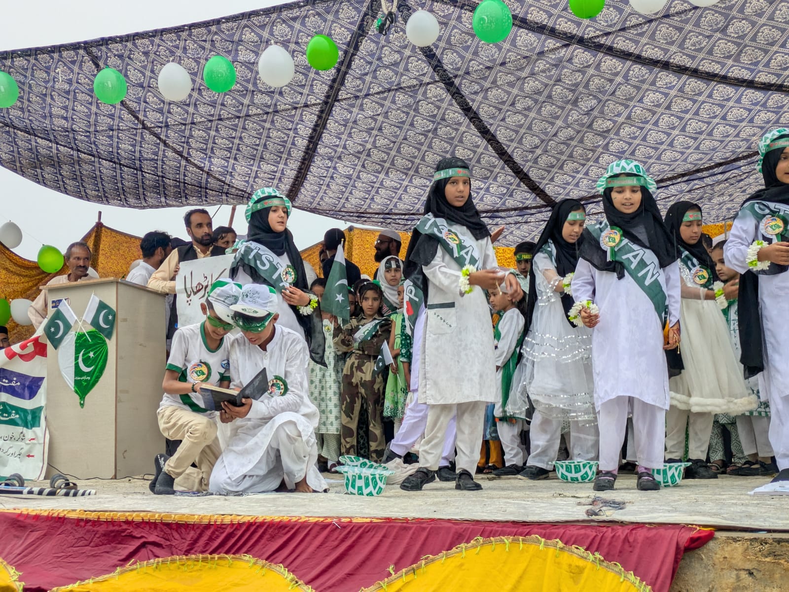 Girls in Pakistan sashes on stage